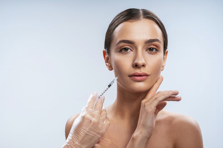 Calm client preparing for an injectables consultation